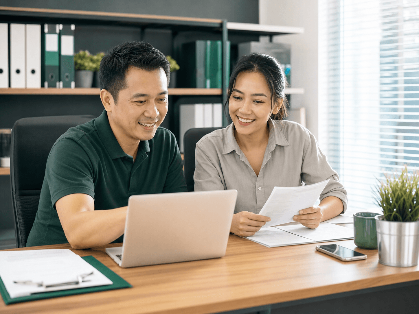 Small business team reviewing bookkeeping documents